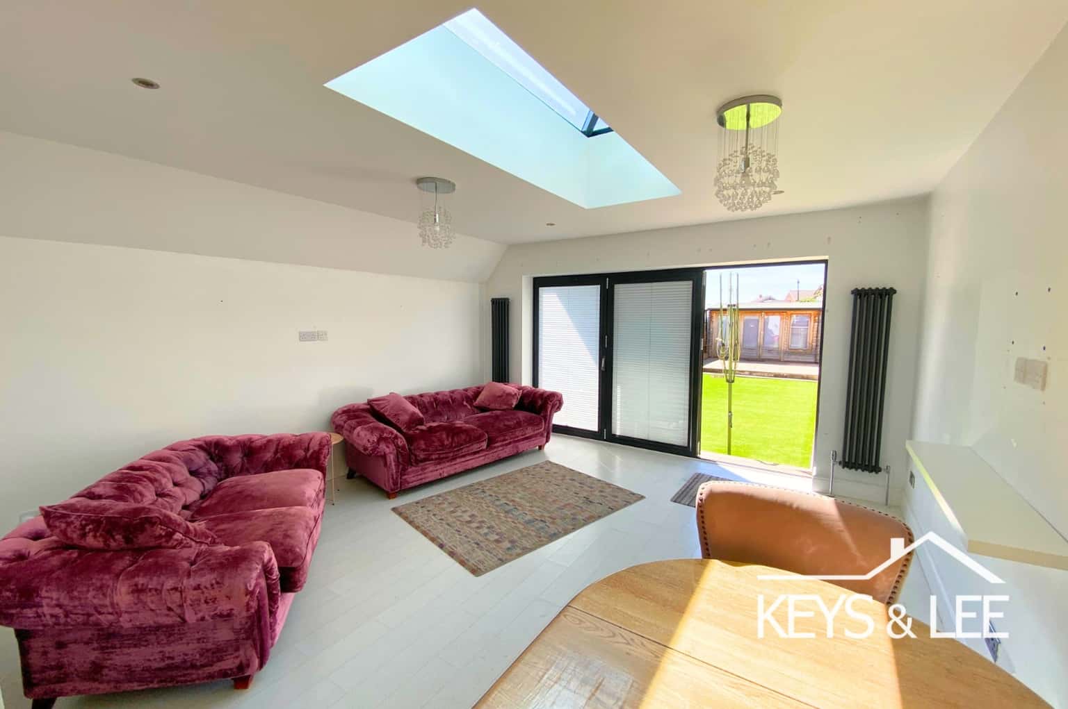 A wonderfully presented 4 bed, 2 bathroom house with a large extension and a spacious back garden. property first image