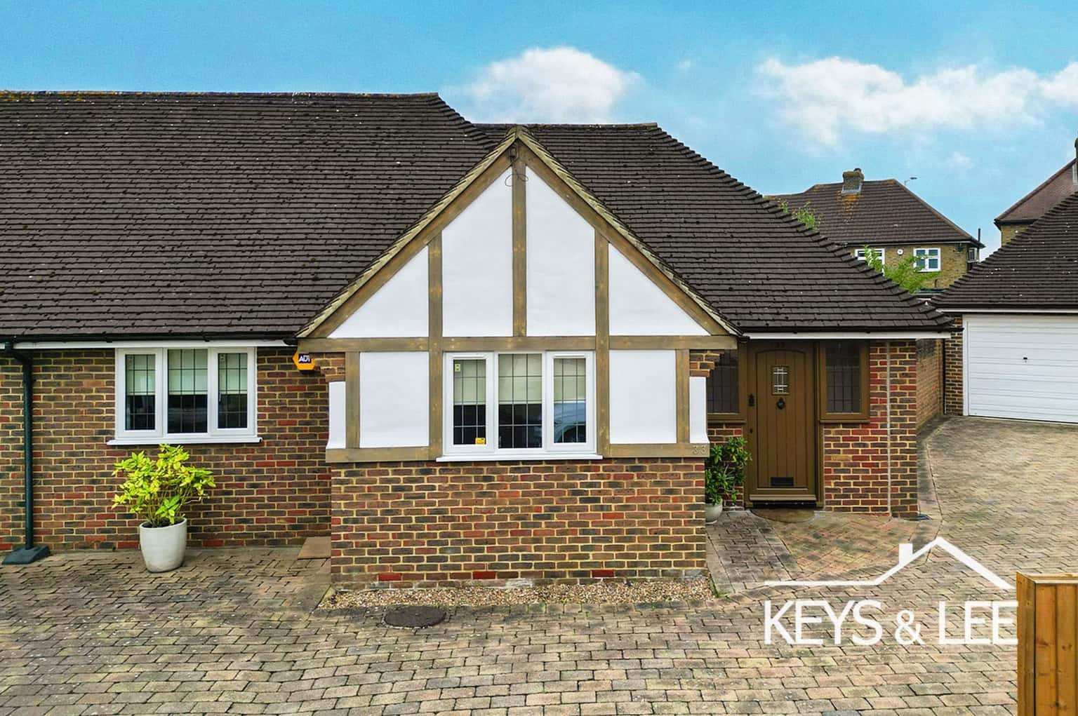 An immaculately presented and modern 2 bedroom bungalow in a quiet cul-de-sac position. property first image