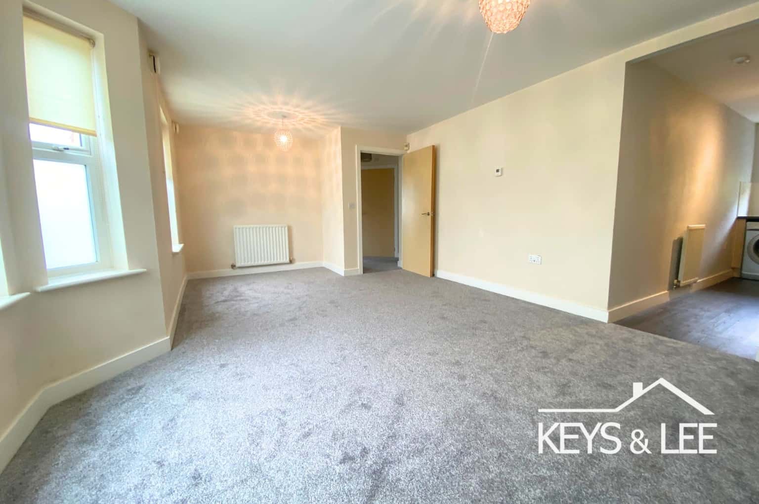 A ground floor 2 bedroom apartment with 2 bathrooms, a private front door and allocated parking. property first image