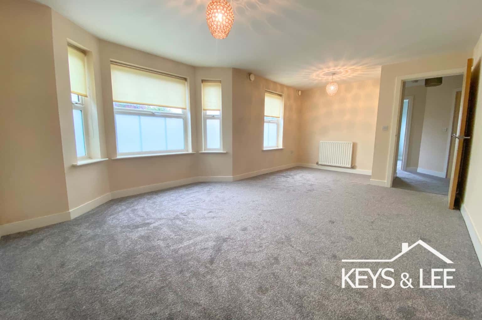 A ground floor 2 bedroom apartment with 2 bathrooms, a private front door and allocated parking. property first image