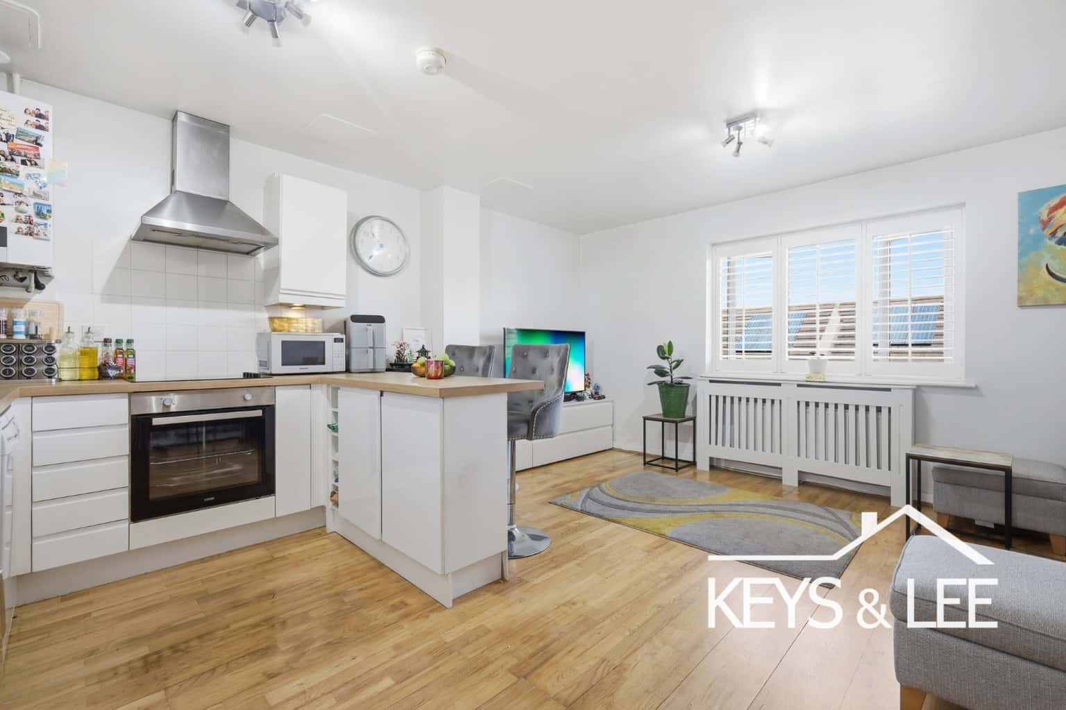 Beautiful, modern top floor apartment with parking, lift access, long lease and no ground rent property first image