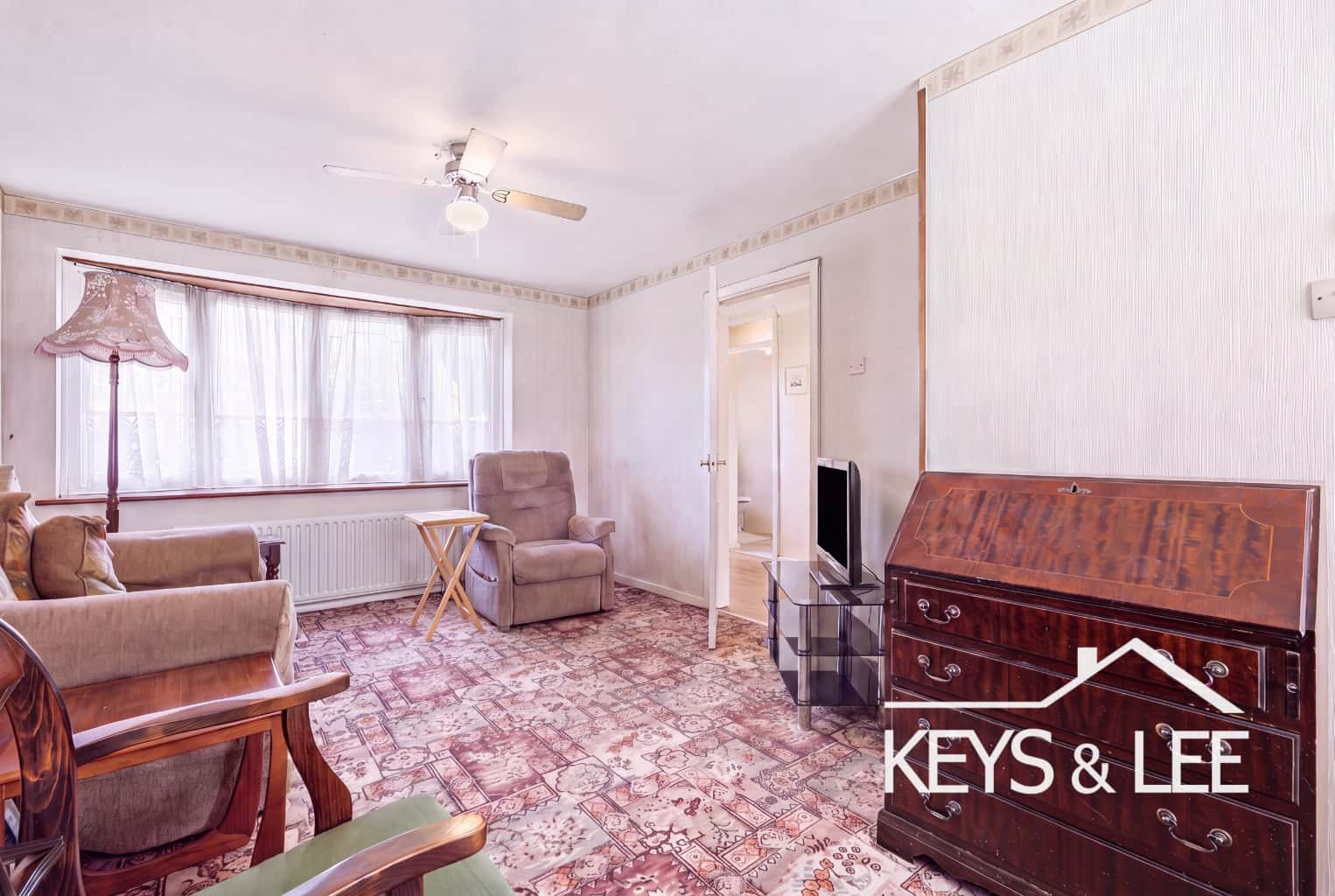 Well cared for end terrace family house with spacious bedrooms, neat back garden and parking. property first image